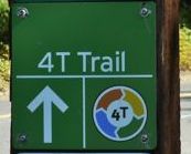 4T signs on the trail are green