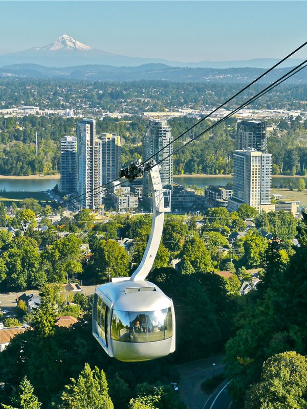 Tram descending from OHSU with Mt. Hood in background